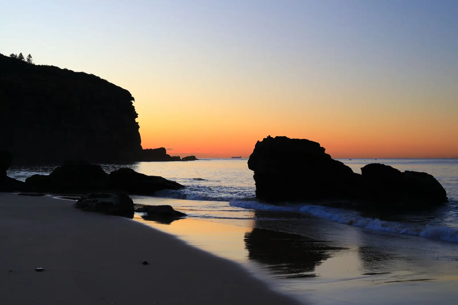 Calm ocean coastline at sunrise, a symbol of hope and new beginnings